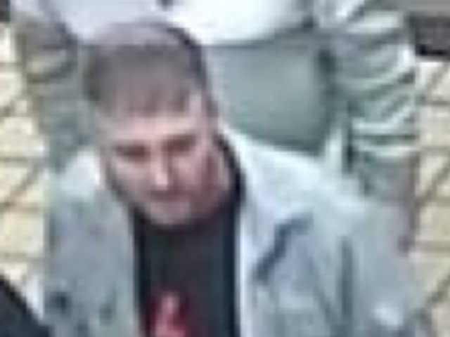Officers want to speak to this man after following a fight a Preston railway station (Credit: British Transport Police)