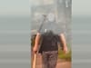 Chilling picture of man armed with large machete walking down street in Preston after stabbing in Ashton