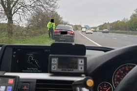A 60-year-old driver was caught by police officers about to smoke heroin on the hard shoulder of the M62.