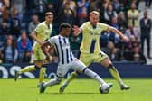 West Bromwich Albion's Grady Diangana holds off the challenge from Preston North End's Jack Whatmough