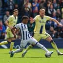 West Bromwich Albion's Grady Diangana holds off the challenge from Preston North End's Jack Whatmough