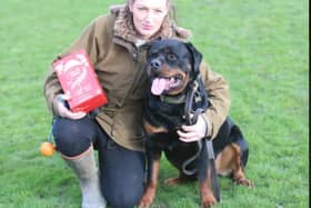 Josie Clark, 32, pictured with her dog Buddy, is using her voice as a platform to urge other sexually abused survivors not to suffer in silence.