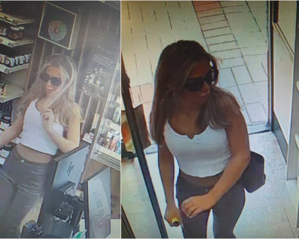 Officers want to speak to this woman in connection with a theft at a Holland & Barrett store in Accrington (Credit: Lancashire Police)