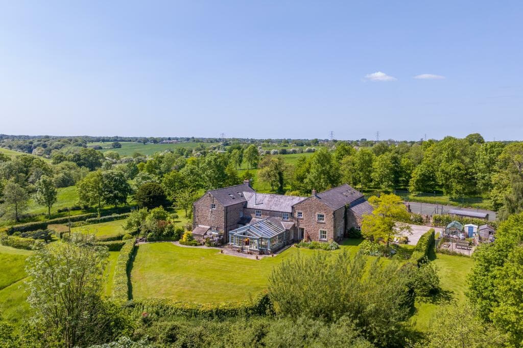 I'd describe it as secluded: 3 storey mansion with 8-acre landscaped garden for sale