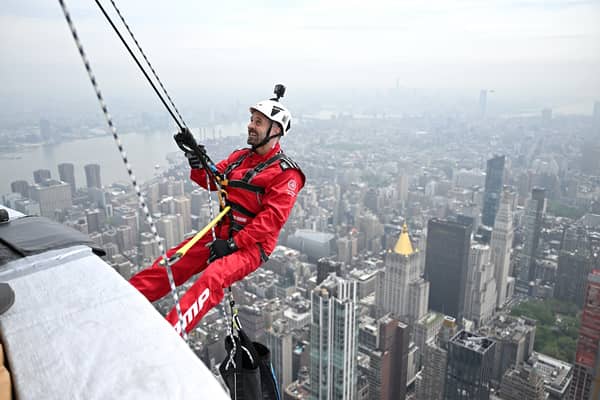 Blackpool's Alfie Boe abseilling - or rappelling as American say - down the Empire State Building.
