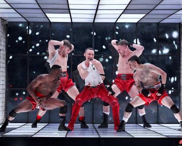 Olly Alexander representing Great Britain with the entry 'Dizzy' performs during a rehearsal for the first semi-final of the 68th edition of the Eurovision Song Contest. Credit: TT News Agency/AFP via Getty Ima
