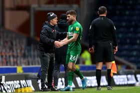 Preston North End manager Alex Neil with Ched Evans