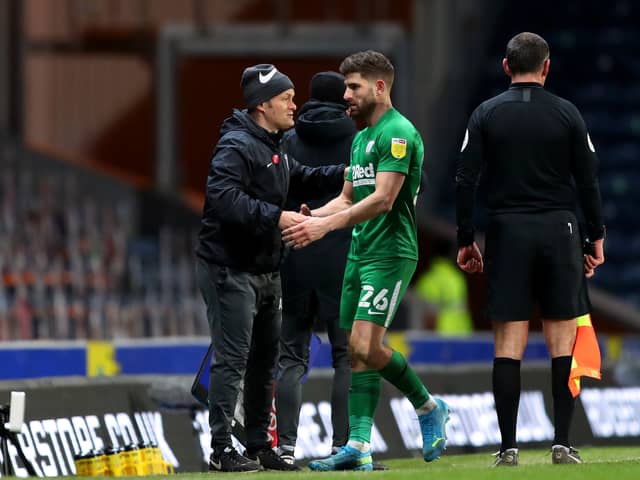 Preston North End manager Alex Neil with Ched Evans