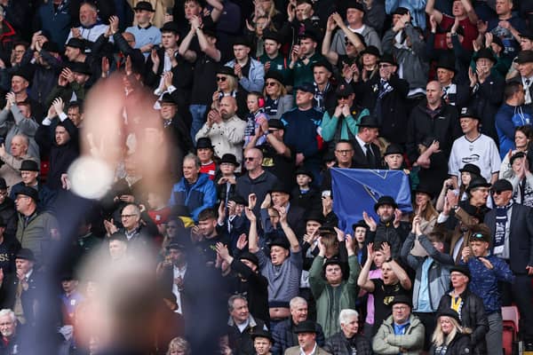 Preston North End fans applaud their team 