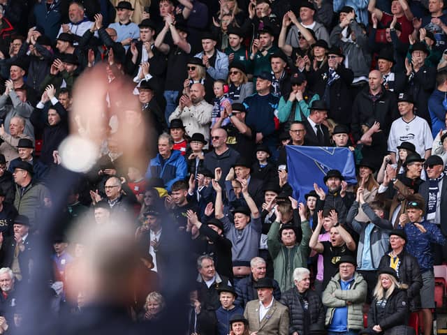 Preston North End fans applaud their team 