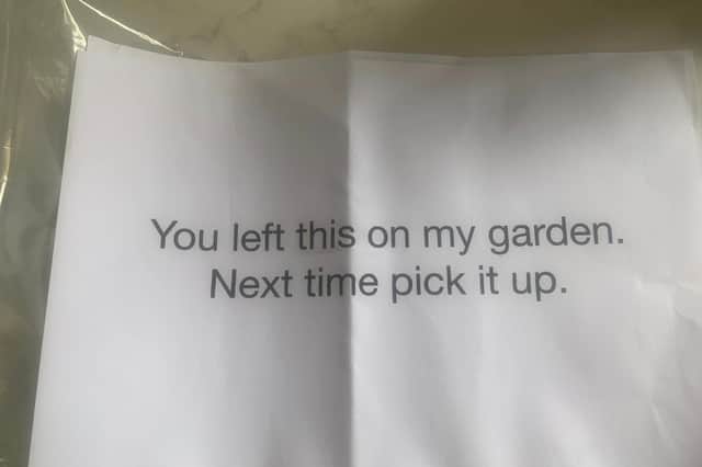 The dog owner found her car smeared with poo and a note on her windscreen saying "You left this on my garden. Next time pick it up."