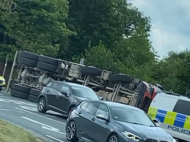 Police are currently dealing with an overturned lorry at the Chorley A6 Hartwood Hall roundabout.