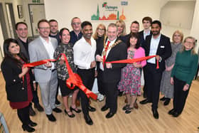 Cllr Chris Lomax, Mayor of South Ribble Borough Council, cuts the ribbon with the local team, to officially open Optegra Eye Clinic in Preston.