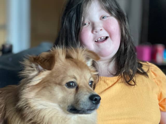 Annie Pickup, 15, with her dog Bolt