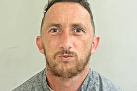 James Lambert is wanted in connection with numerous offences (Credit: Lancashire Police)