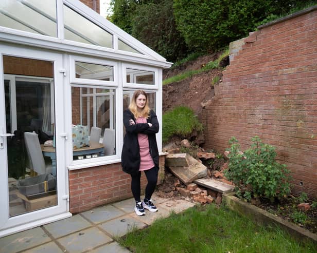 Lucy Gawthorpe at her home where a wall has collapsed. 