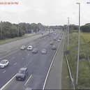 Traffic is being forced to slow down betwee  junctions 32 and 33 of the M6 in Lancashire.