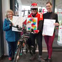 Cycling heroes Tony and Dorothy Newton and their granddaughter Hannah Wotherspoon.