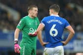 Jordan Pickford with James Tarkowski