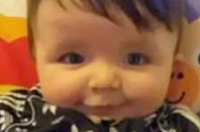 Harlow's parents said he was a 'happy, smiling boy who loved to sing with his sisters'.