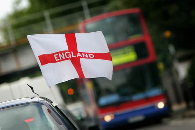 An England flag to support the English team for the 2006 World Cup in Germany on a car  (Photo: Daniel Berehulak/Getty Images)