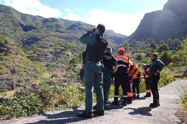 Emergency workers near the village of Masca, Tenerife, where the search for missing British teenager Jay Slater, 19, from Oswaldtwistle, Lancashire, continues. Jay was last heard on Monday morning after attempting to walk back to his accommodation when he missed a bus, after staying with people he met at the NRG music festival in Tenerife, Spain's Canary Islands. Picture date: Friday June 21, 2024. PA Photo. See PA story POLICE Tenerife. Photo credit should read: James Manning/PA Wire