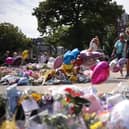 Flowers and tributes outside the Atkinson Art Centre in Southport