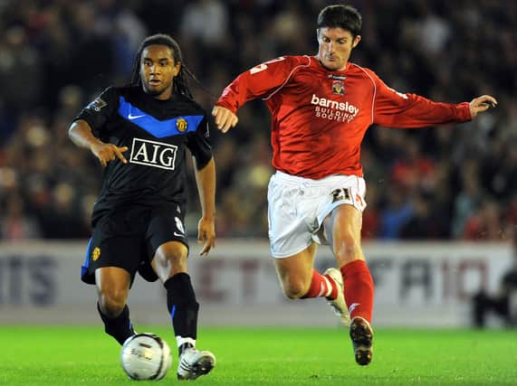 Jon Macken (R) spent a large part of his career at Preston North End. He is now a football manager. (Image: AFP PHOTO/ANDREW YATES via Getty Images)