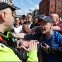 Protesters initially gathered outside Blackpool cenotaph before marching through the town. Credit: PA