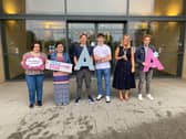 Students and their Principle Nicola Craven, celebrate their A Levels.