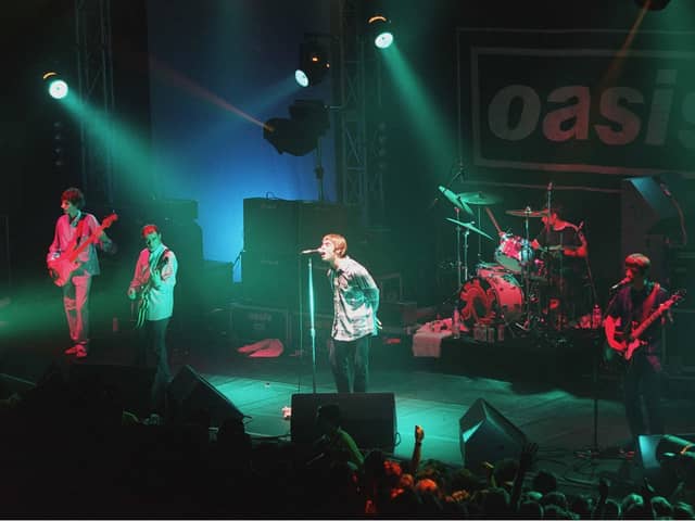 Oasis Performing In Blackpool - 1995 (Photo by Brian Rasic/Getty Images)