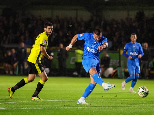 Preston North End's Milutin Osmajic scores his side's third goal 