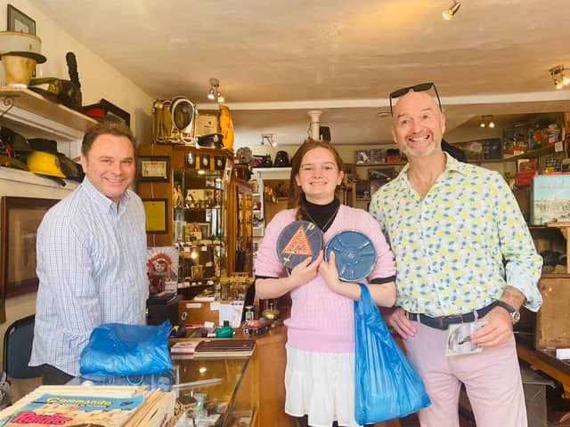 Matilda and David in a local antique shop securing some bargains.