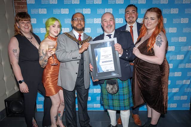 The Winedown team receiving bar of the year at the High Street Heroes Awards – with Dougie in his kilt
