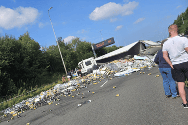 The M6 was closed in both directions after a lorry overturned between Leyland and Standish on Friday afternoon.