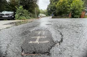 A manhole cover on Cowling Brow has been temporarily covered with tar, for safety reasons, following a fatal crash last month