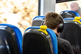 A customer on-board a Northern train.