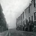 Mount Pleasant West, Preston 1950. Former handloom weavers cellared cottages close to Corporation Street. The scene appears to be older than it looks. It would have looked very much the same in the mid 19th century