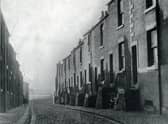 Mount Pleasant West, Preston 1950. Former handloom weavers cellared cottages close to Corporation Street. The scene appears to be older than it looks. It would have looked very much the same in the mid 19th century