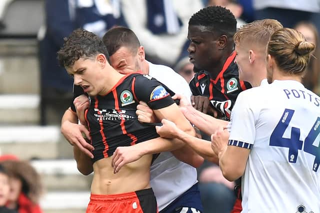 Blackburn Rovers' Owen Beck and Preston North End's Milutin Osmajic