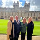 Coun Williams at Windsor Castle to receive her MBE, with her daughters Rosalyn (left) and Grace (right) and partner Patrick.