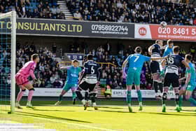Preston North End's Liam Lindsay heads at goal from a corner kick