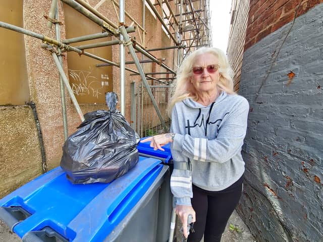 Annie Valentine is sick of people putting rubbish in the recycling bins.