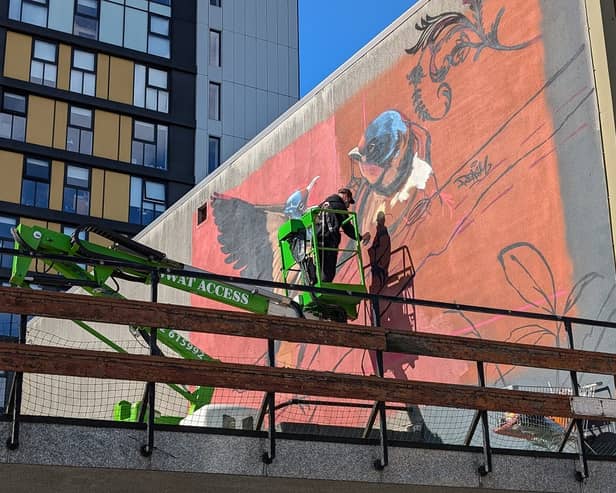 Preston artist Shawn Sharpe is part-way through another masterpiece in the city centre. 