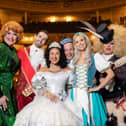 The full Cinderella panto cast dressed as their characters.