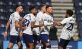 Preston North End's Sam Greenwood is congratulated