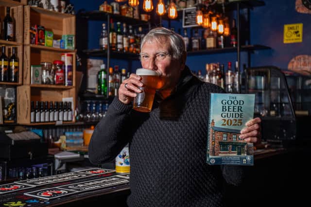 Rob Cocker, from Stoke-on-trent, with his good beer guide in his local pub Manor Court Ale House enjoying a pint of beer to add to his list. So far he has visited over 12,000 pubs in 55 years. Photo: William Lailey / SWNS
