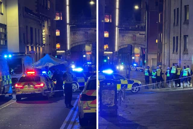Cowgate was swarming with police and forensics after a 74-year-old man was hit by a bus