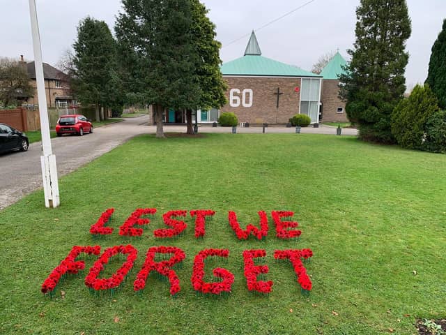 Poppies on the lawn at All Saints, New Longton