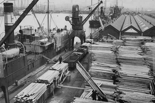 Past post dock 1930's - the offloading of planks old Preston docks